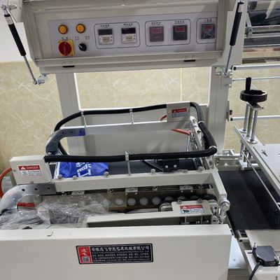 Máquina de envoltura de película térmica automática y túnel de contracción para el embalaje de la caja