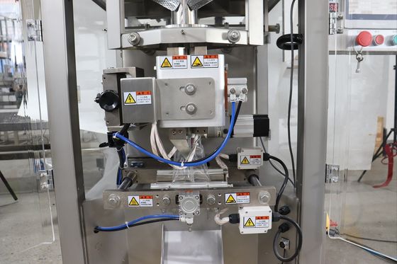 Máquina de embalaje de nueces de 350 kg con bolso de sellado de tres lados de la taza de medición y forma de sellado térmico