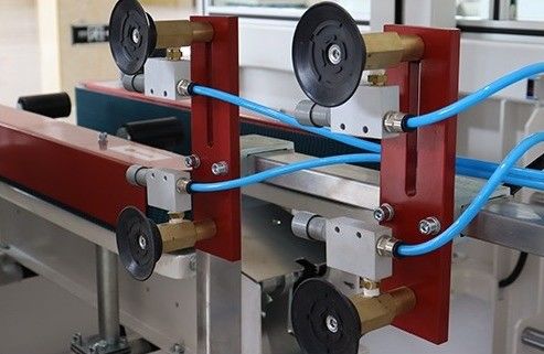 Ejecutor de cartón de carga de 450 kg con sellado automático y plegado en el fondo
