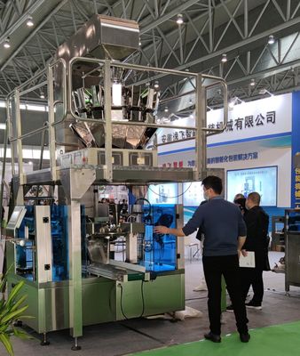 Máquina automática de embalaje de alimentos en gránulos para caramelos en bolsas triangulares de 400 kg de capacidad