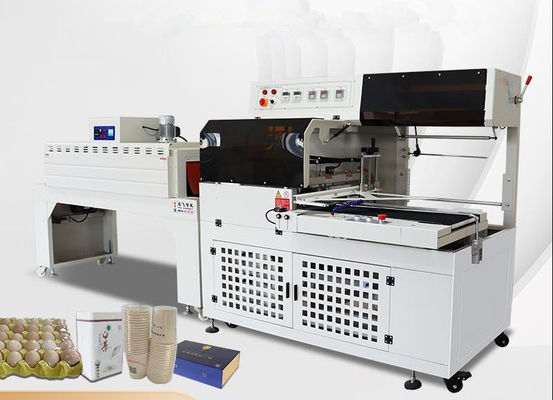 Máquina de sellado y corte de película de plástico PE POF PVC automática con accionamiento eléctrico con máquina de embalaje de contracción térmica