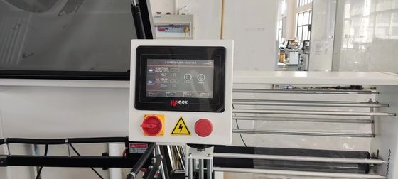 Máquina de envoltura de plástico con sellador L de 55 cm de ancho máximo para envases de envoltura de caja de calor