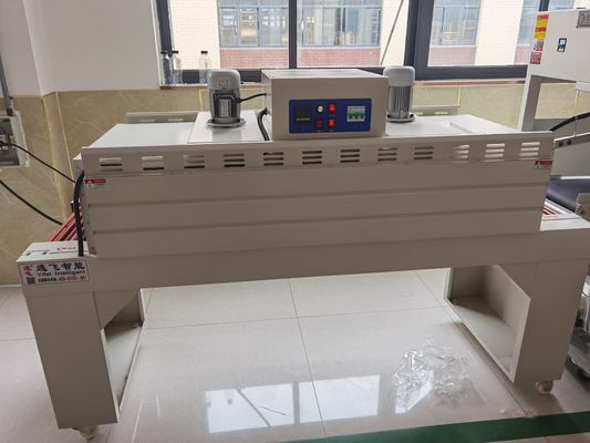 Máquina de envoltura de plástico con sellador L de 55 cm de ancho máximo para envases de envoltura de caja de calor