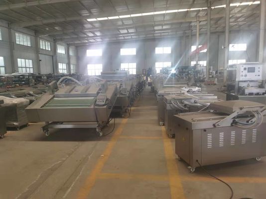 Máquina de embalaje a vacío de tipo de cinta continua para camarones secos y salmón ahumado