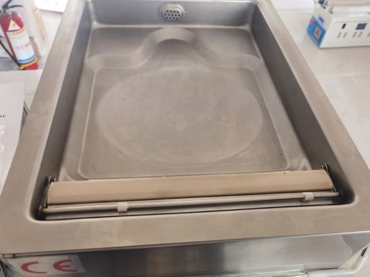 Máquina de embalaje a vacío de escritorio de cámara única para alimentos en hoteles